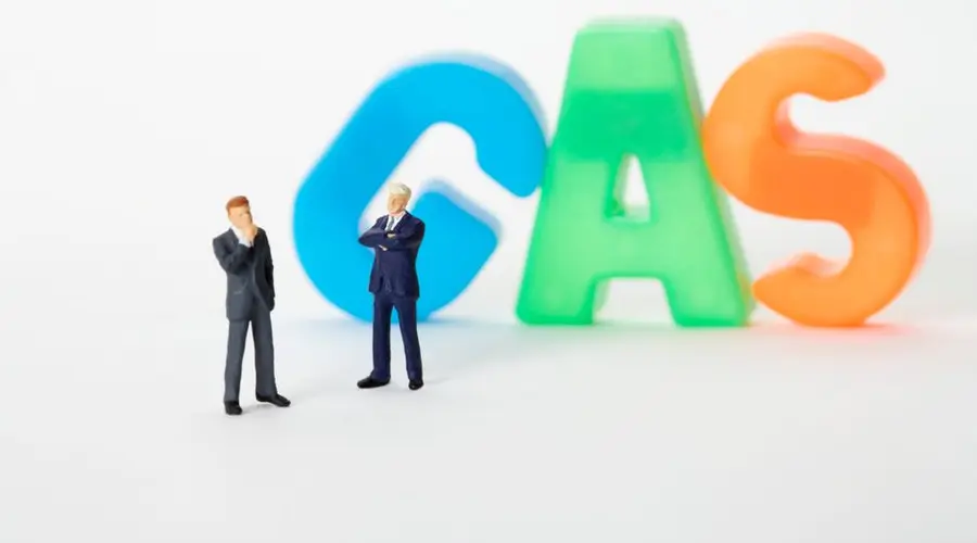 Creative image of toy businessmen with colorful gas letters, symbolizing industry concepts.