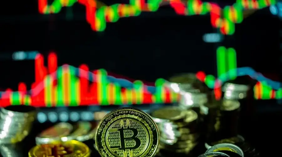 Golden bitcoin coins with a financial growth chart, representing digital investment opportunities.