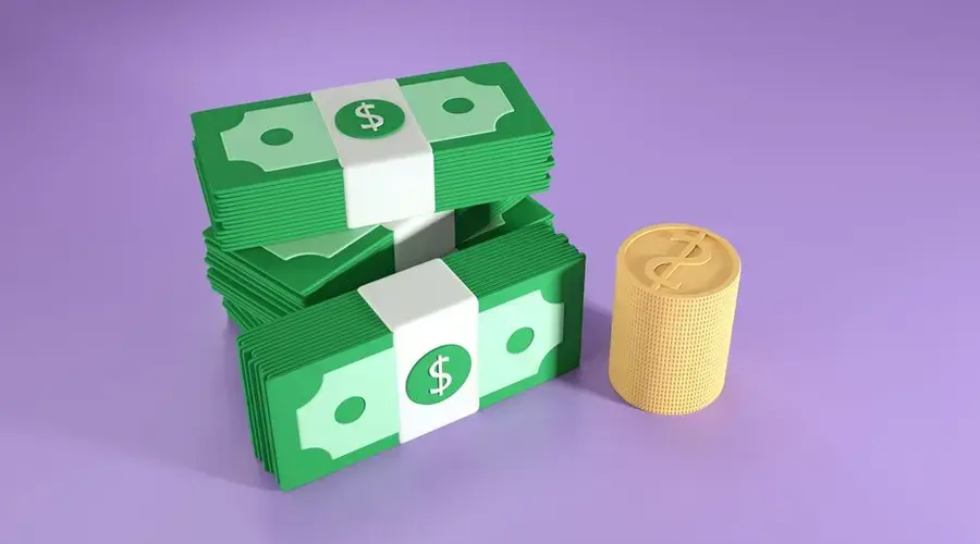 3D illustration of stacked dollar bills and coins, symbolizing finance and wealth.
