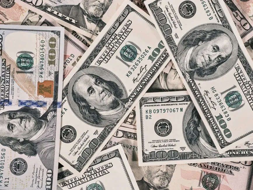 Detailed close-up of US dollar bills highlighting wealth and finance concepts.