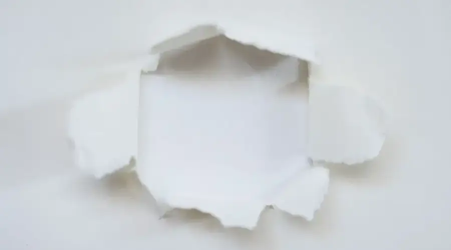 White paper torn with an empty center, perfect for abstract designs.