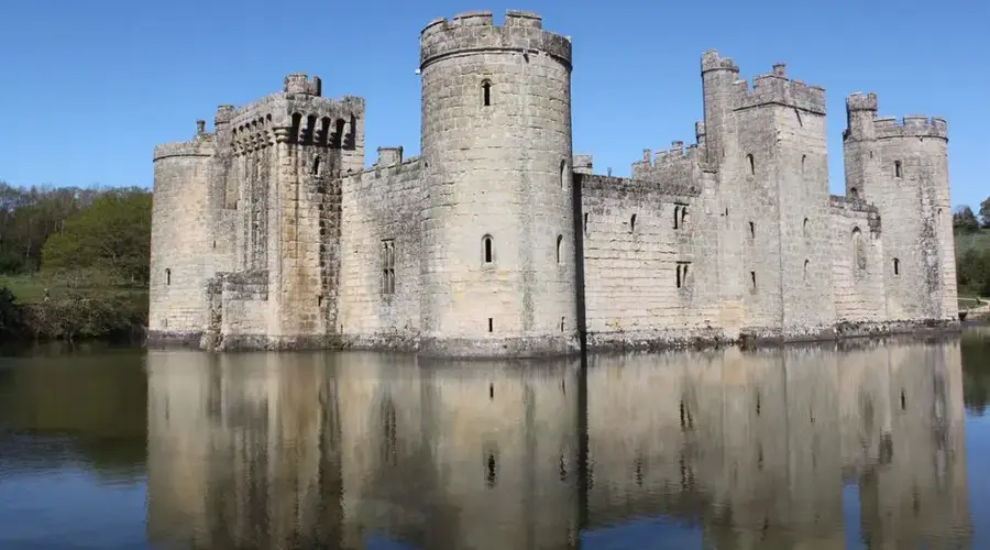 Scenic view of medieval Bodiam Castle surrounded by a moat in England.