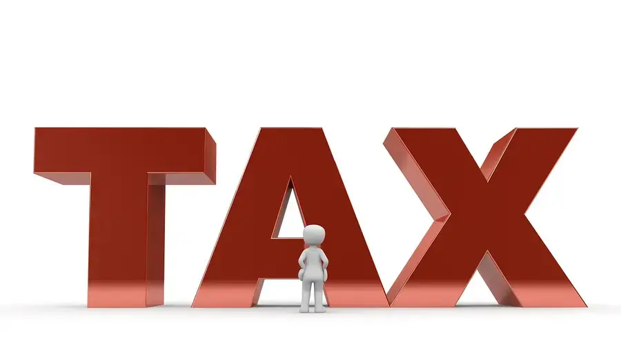 tax documents finance paperwork Roth IRA Traditional income limits
