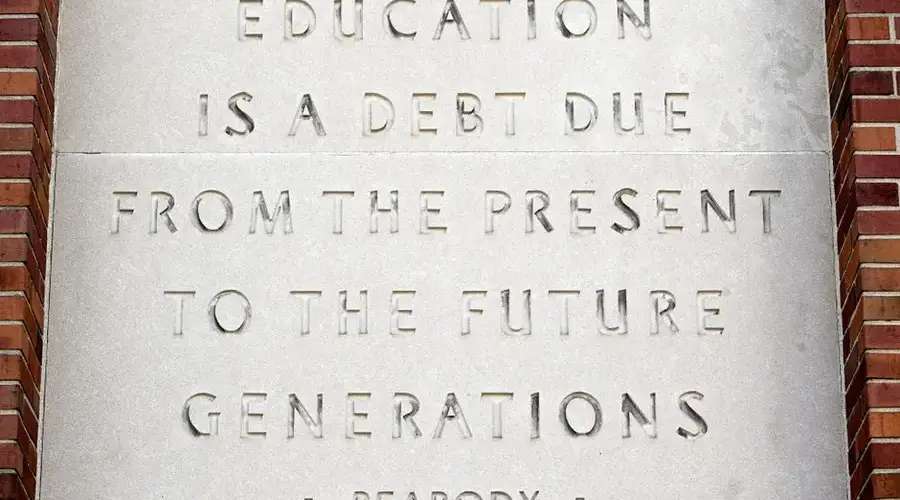 Engraved quote on building about the value of education in Covington, Kentucky.