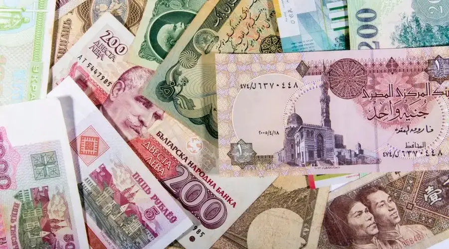 A vibrant collection of various international banknotes showcasing global diversity.