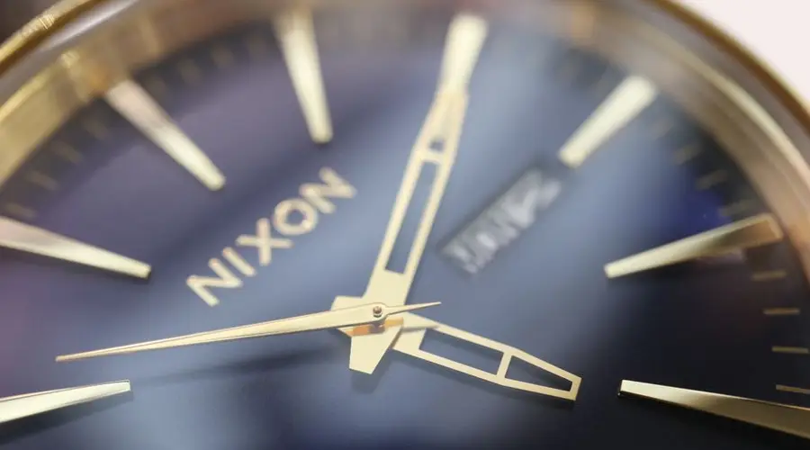 Detailed view of a Nixon watch showcasing its elegant and precise craftsmanship.