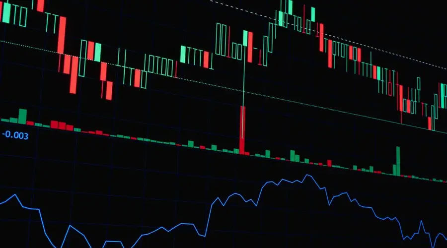 Colorful stock market chart showing candlestick patterns and line graph for financial analysis.