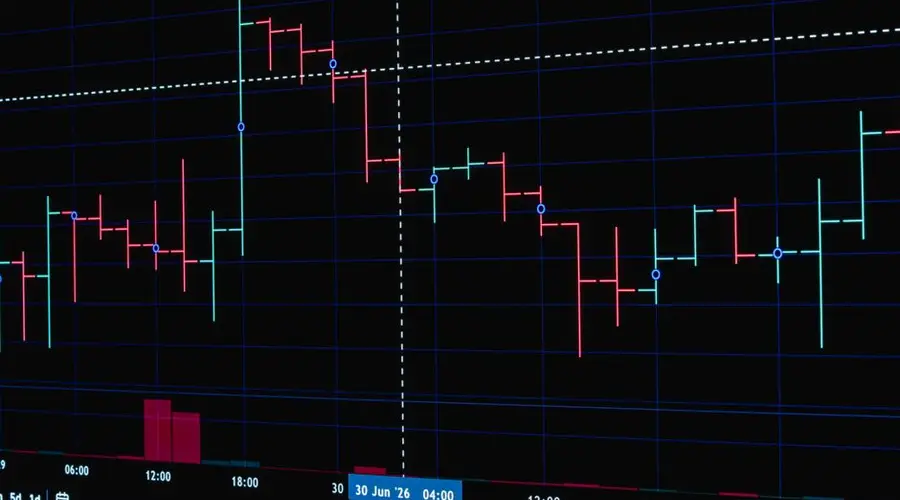 Stock market trading graph with dynamic price changes on digital display.