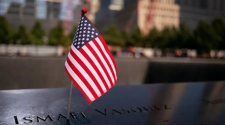 Close-up of a small American flag at the 9/11 Memorial in New York City.