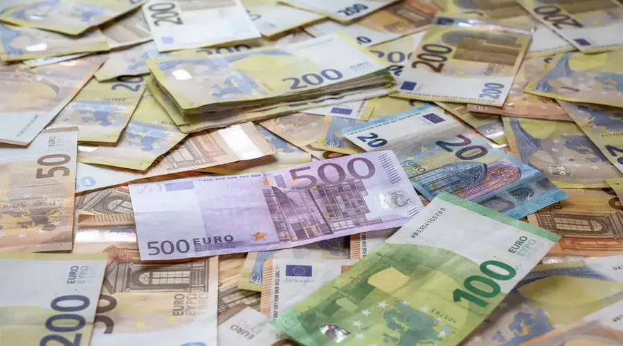 A collection of Euro banknotes representing wealth, savings, and European economy.