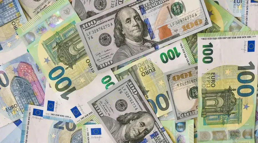A detailed collage of Euro and Dollar banknotes showcasing international currency exchange.