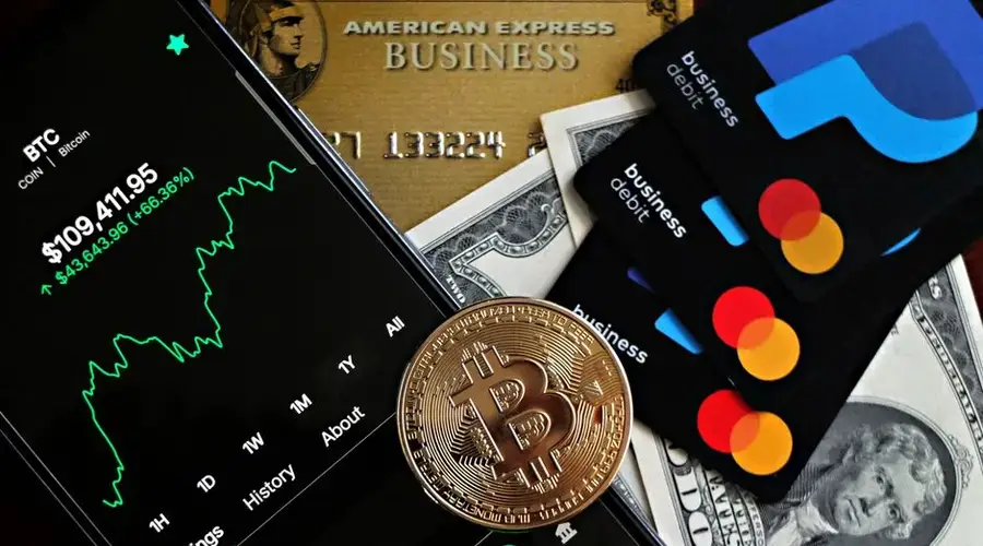 A dynamic image showcasing Bitcoin, credit cards, and financial apps for investment enthusiasts.