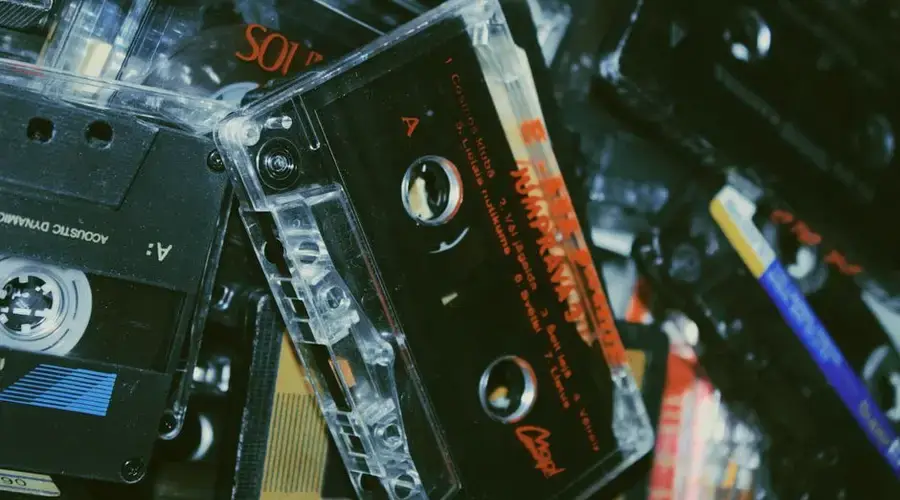 A nostalgic close-up of various vintage cassette tapes showcasing classic analog sound.