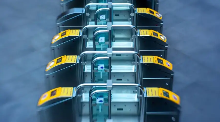 Elevated view of subway turnstiles showing modern transportation infrastructure.