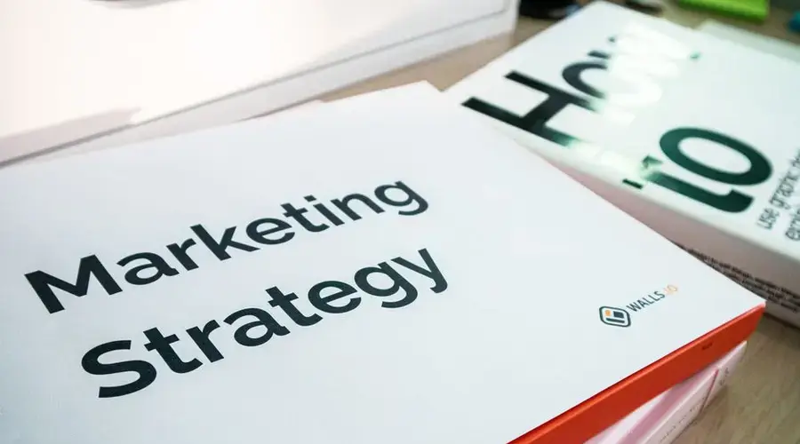 A detailed view of marketing strategy documents with close focus on text, ideal for business and finance content.