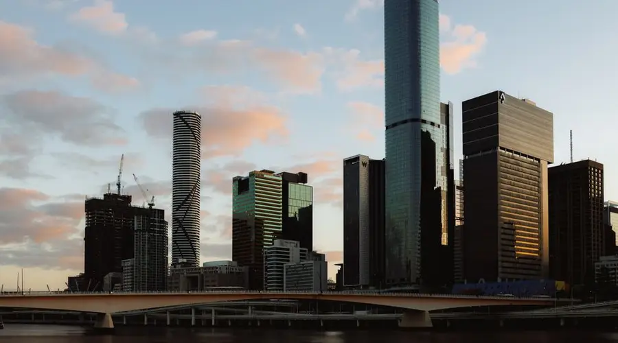 Capture of Brisbane city's modern skyline with skyscrapers at sunset, Australia.
