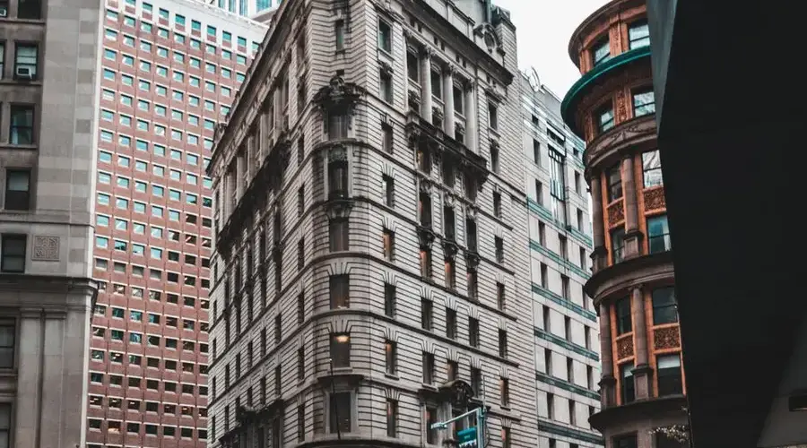 Dynamic view of architectural buildings in downtown Manhattan showcasing urban design.