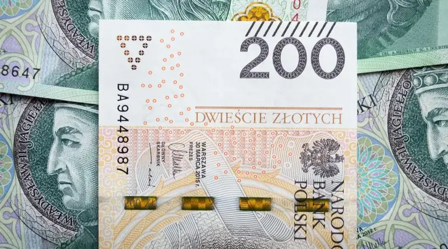 Detailed view of Polish 200 Zloty banknotes for financial and economic subjects.