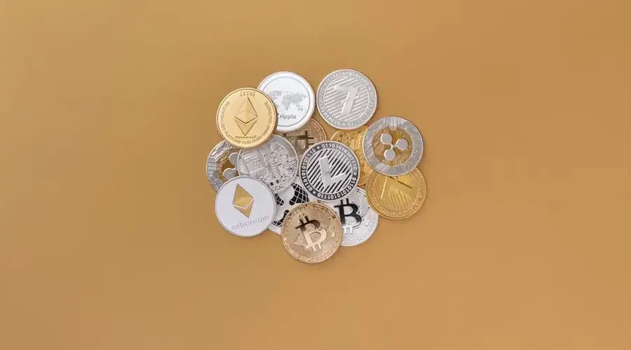 A cluster of cryptocurrencies including Bitcoin, Ethereum on a subtle background symbolizing digital finance.