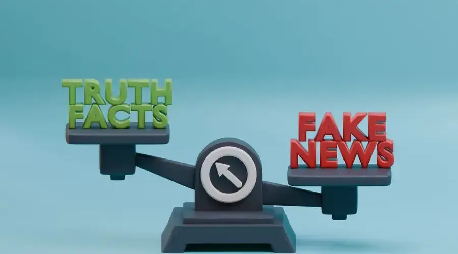 3D illustration of a scale balancing truth and fake news concept against a blue background.