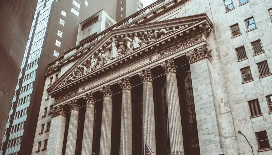 Historic New York Stock Exchange building facade captured in a vintage style.