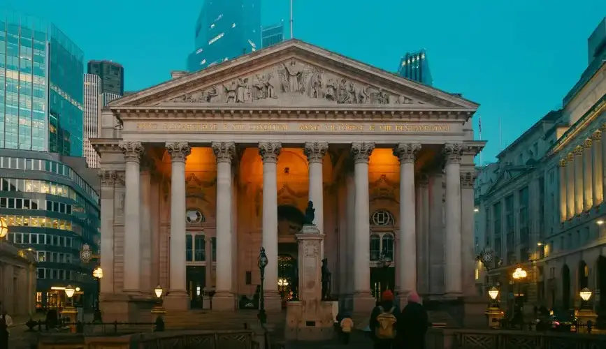 Stunning view of the Royal Exchange building in London during twilight.