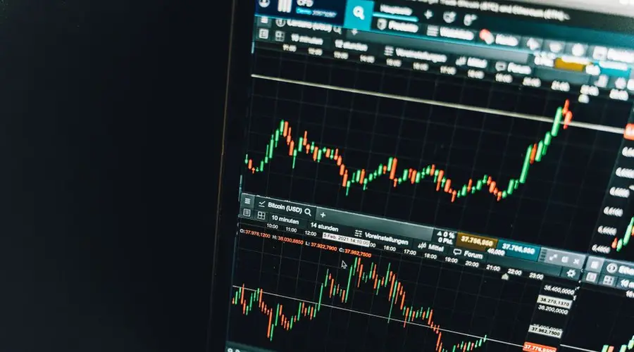 Close-up of a live cryptocurrency trading chart screen displaying dynamic market trends and analysis.