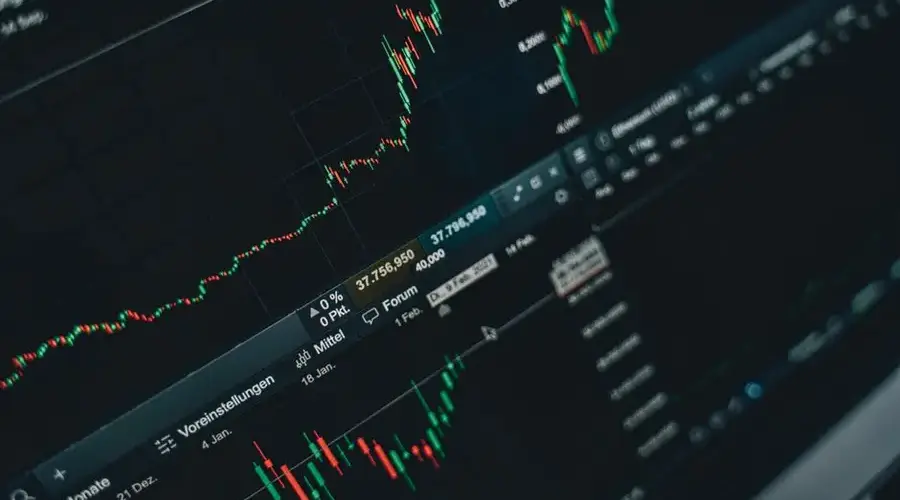 Close-up of stock market trading screen displaying financial growth and charts.
