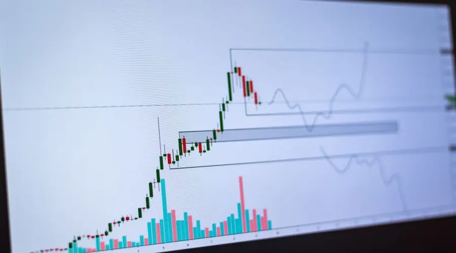 Detailed view of a cryptocurrency trading chart on a computer screen, showing market trends and price movements.
