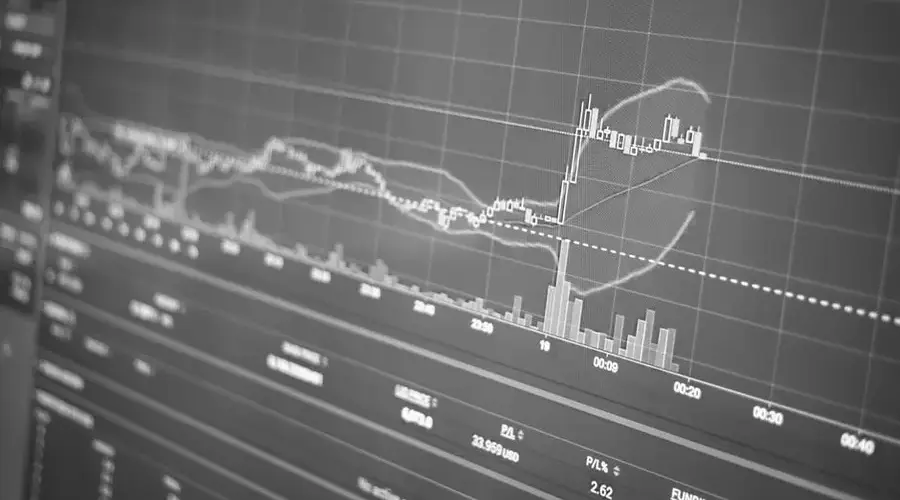 Black and white display of financial chart with data and statistics for trading analysis.