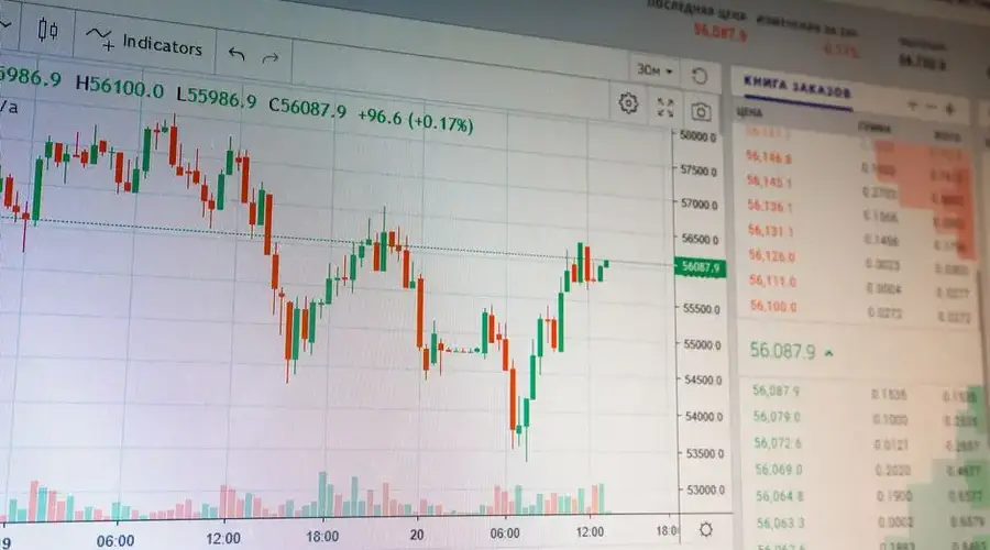 Close-up of digital cryptocurrency market graph showing price fluctuations and trading data.