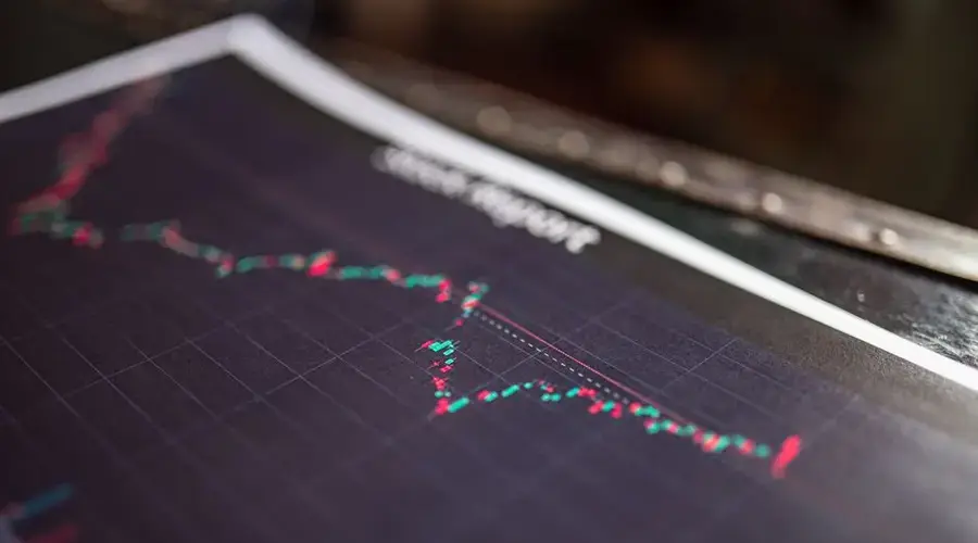 Close-up of a stock report showing a financial data graph.