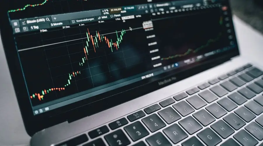 Close-up of a financial graph on a laptop screen, depicting stock market analysis in Berlin.