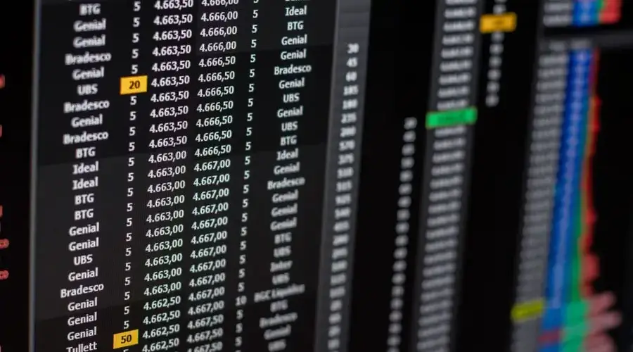Close-up of financial data on a computer screen showing stock market trends.