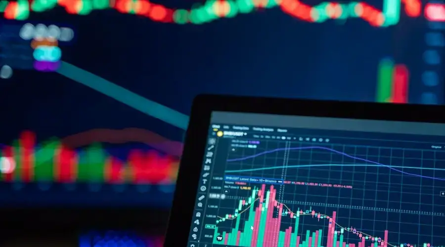 Colorful trading charts showing cryptocurrency market trends on a computer screen.