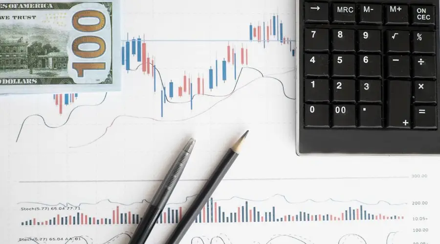 Stock analysis workspace featuring charts, a calculator, and currency for data-driven insights.