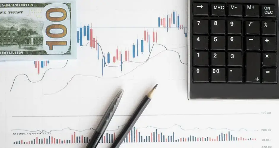 Stock analysis workspace featuring charts, a calculator, and currency for data-driven insights.
