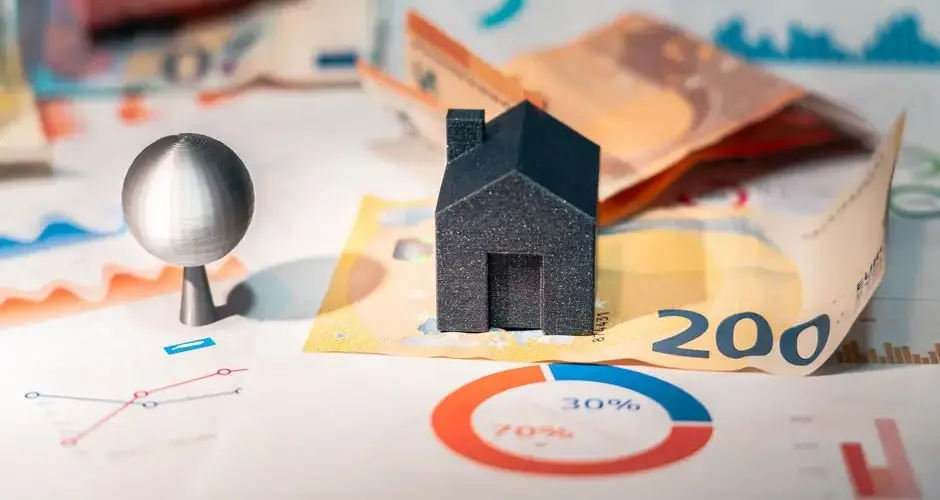 Conceptual image of real estate and finance involving euro currency and data charts, symbolizing investment.