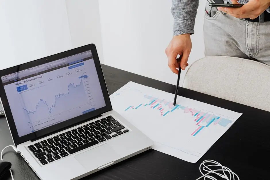 Person analyzing cryptocurrency data using a laptop, highlighting financial insights.