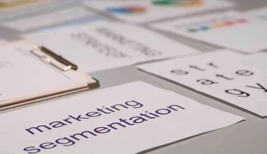 Close-up of various marketing documents on a desk, perfect for business and strategy discussions.