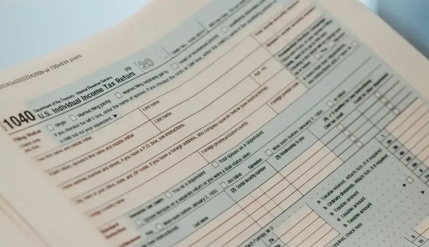 Detailed close-up image of a U.S. 1040 Individual Income Tax Return form, ideal for finance-related content.