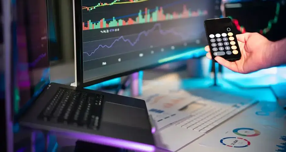 A vibrant setup showcasing financial analytics on screens, ideal for fintech themes.