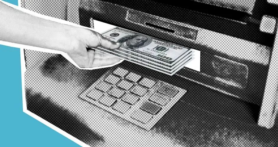 Decorative cardboard illustration of hand of person withdrawing pile of dollar banknotes from automated teller machine
