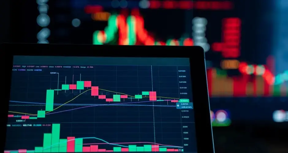 Close-up view of digital trading chart screen with vibrant graphs and data analysis.