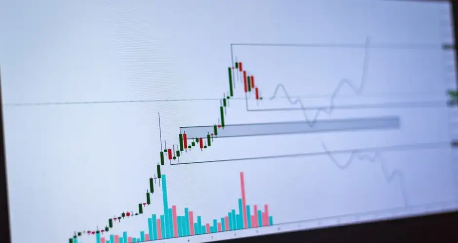 Detailed view of a cryptocurrency trading chart on a computer screen, showing market trends and price movements.