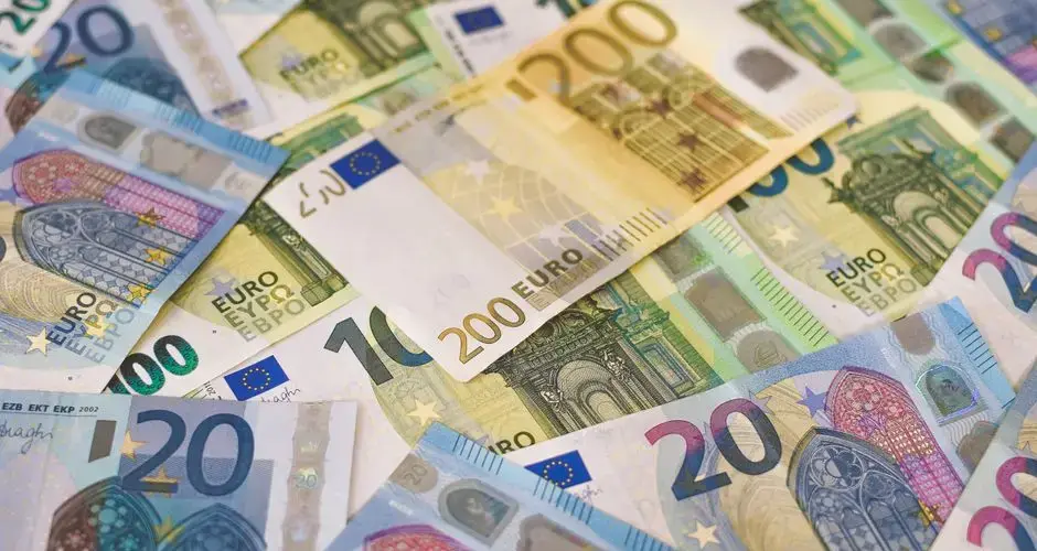 Colorful assortment of Euro banknotes in various denominations, signifying wealth and finance.
